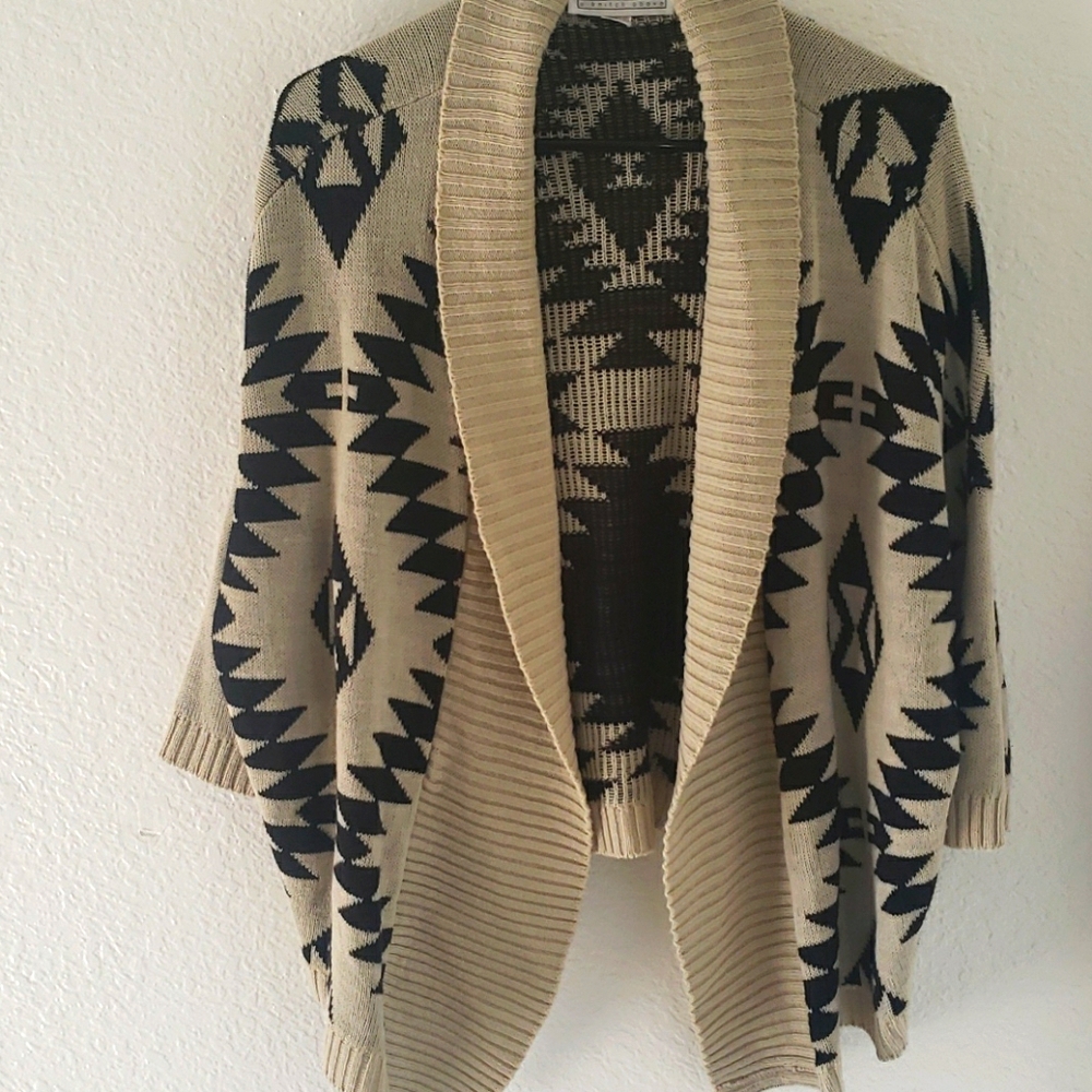 A Knitch Above Sweater